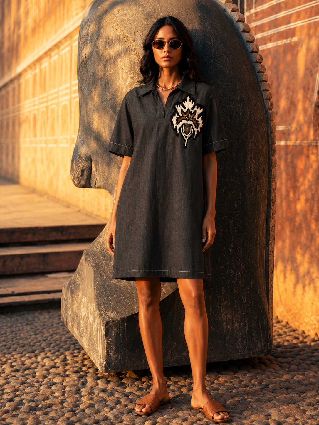 Denim dress with hand embroidered flower motif