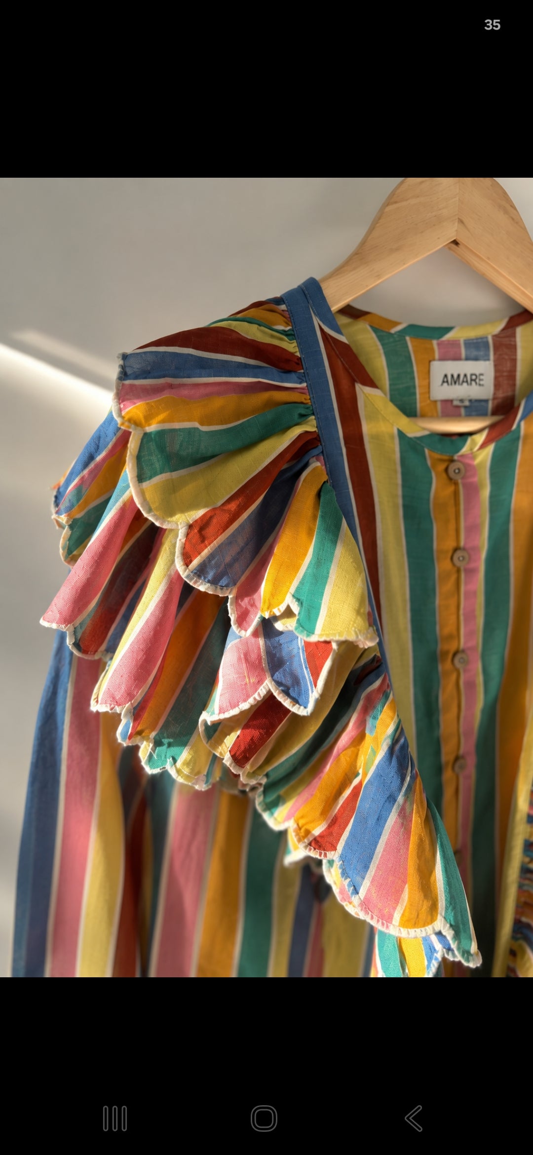 Striped shirt with scallop embroidery