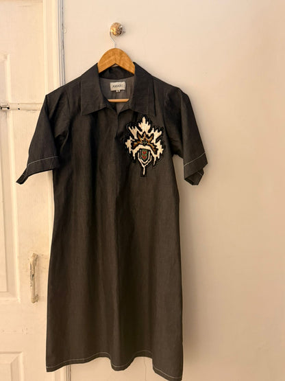 Denim dress with hand embroidered flower motif